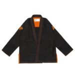 RS350 Bjj Gi black version of Albino and Preto Batch 59 featuring custom high-contrast orange accent embroidery.