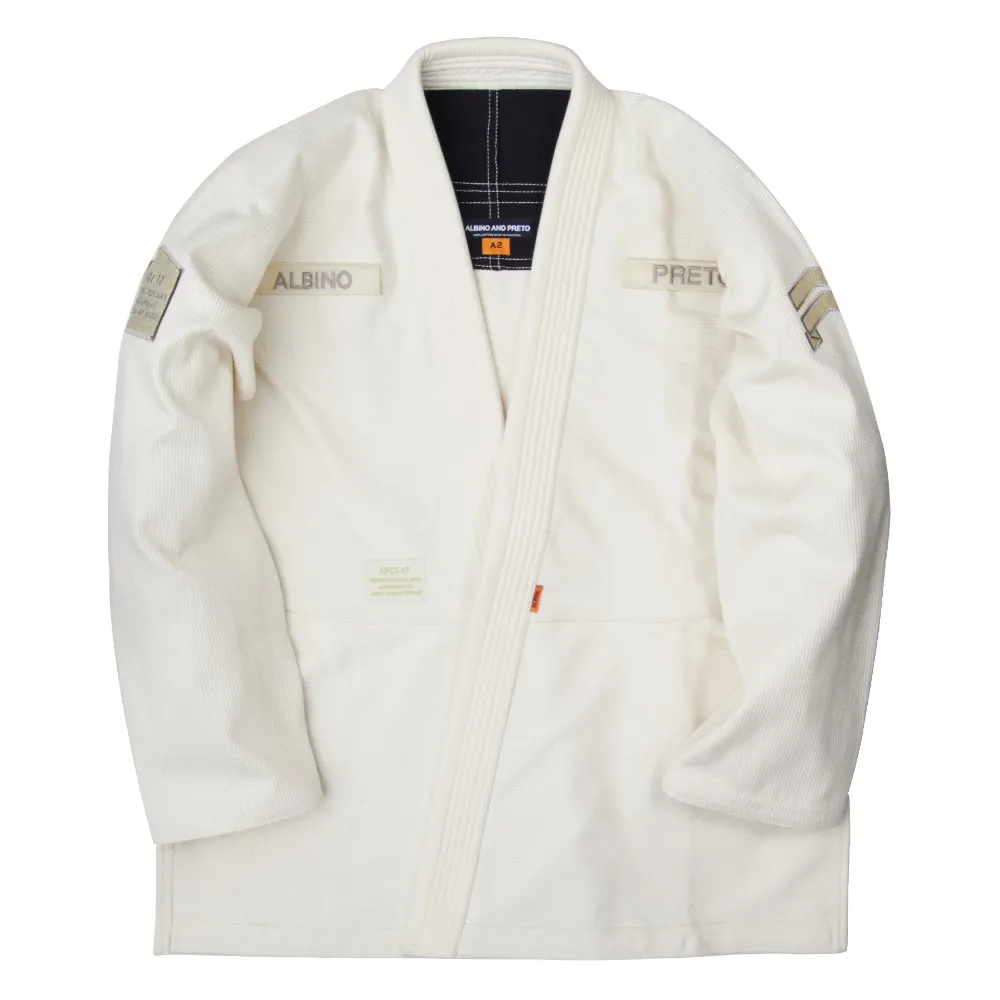 Albino and Preto Batch #21 BJJ Gi Adapt and Overcome Unbleached Albino and Preto Batch #21 BJJ Gi Adapt and Overcome Unbleached lightweight Brazilian Jiu-Jitsu gi for competition and daily training