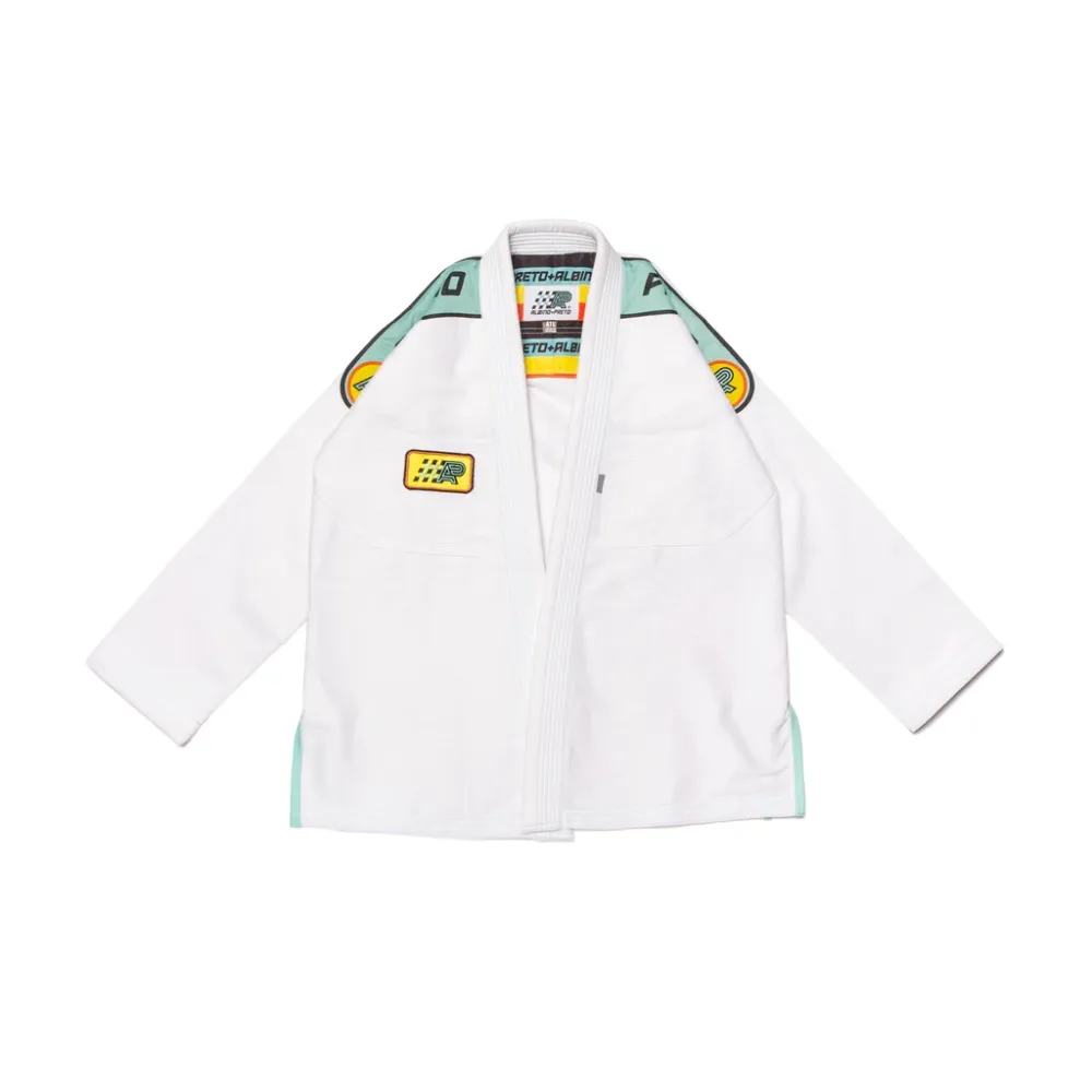 Albino and Preto Batch 66 Monaco BJJ Gi in white showing teal and yellow shoulder embroidery and woven artwork patches Albino and Preto Batch 66 Monaco BJJ Gi in white showing teal and yellow shoulder embroidery and woven artwork patches