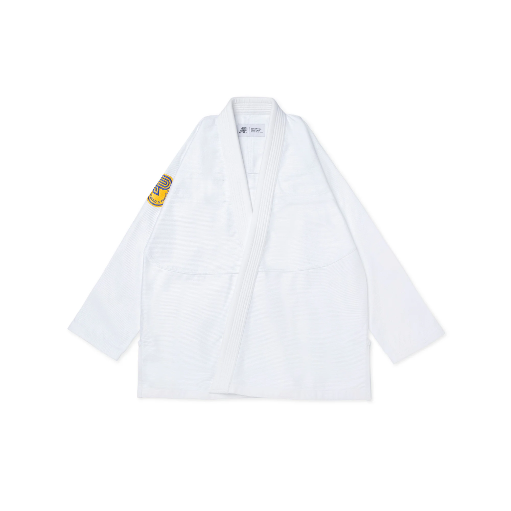 YB BJJ Gi Essential Albino and Preto White Kimono with Bag YB BJJ Gi Essential Albino and Preto Brazilian Jiu-Jitsu white kimono with carrying bag for training and competition